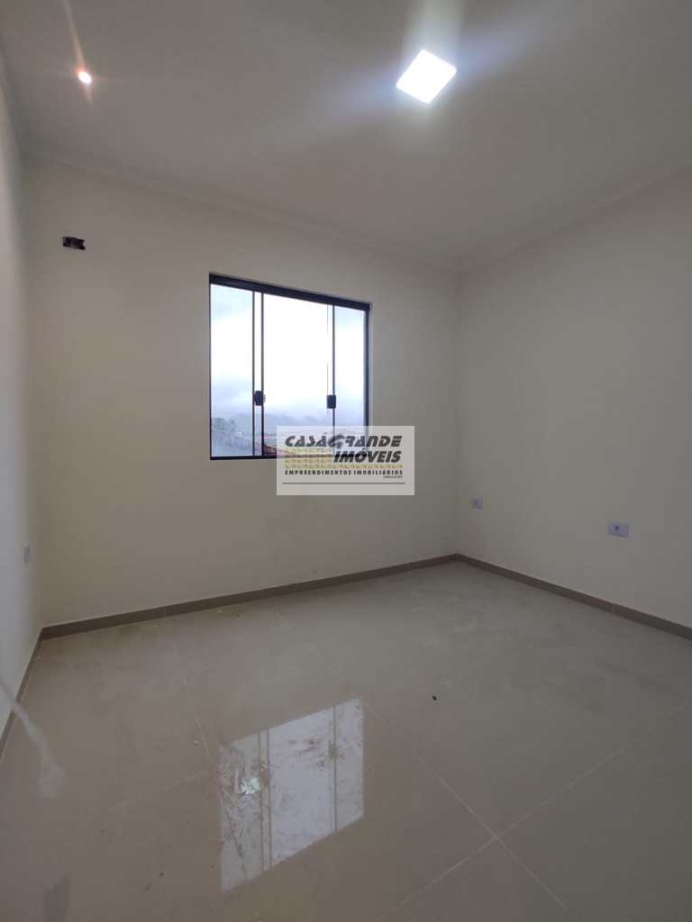 Sobrado em Praia Grande, no bairro CaiÃ§ara