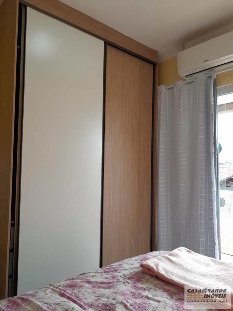 Casa de CondomÃ­nio em Praia Grande, no bairro MaracanÃ£