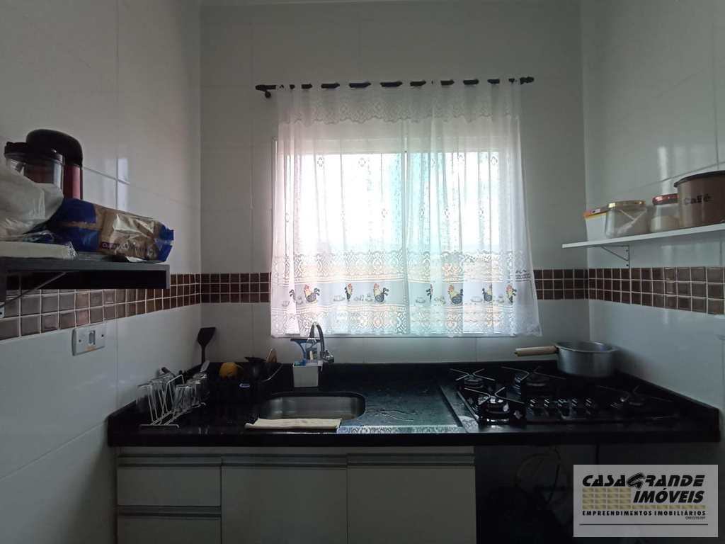 Casa de CondomÃ­nio em Praia Grande, no bairro MaracanÃ£