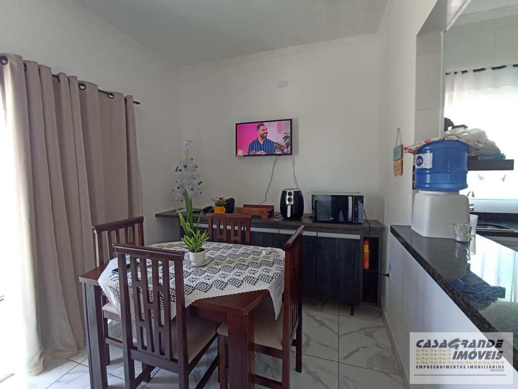 Casa de CondomÃ­nio em Praia Grande, no bairro MaracanÃ£