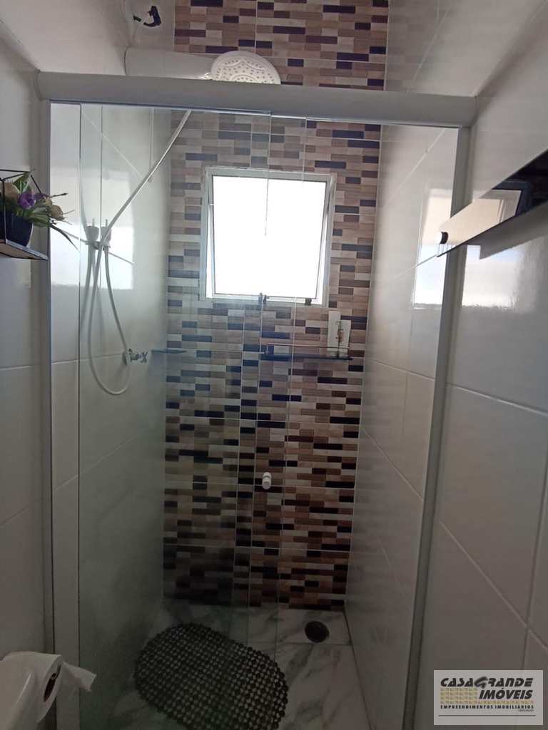 Casa de CondomÃ­nio em Praia Grande, no bairro MaracanÃ£