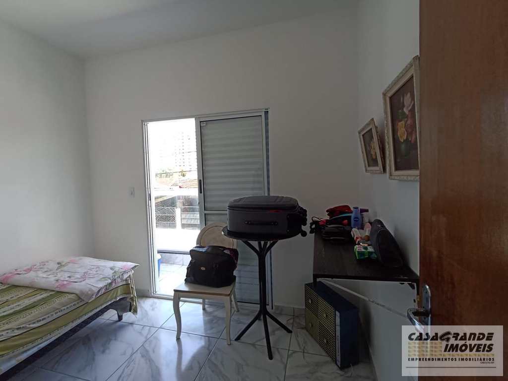 Casa de CondomÃ­nio em Praia Grande, no bairro MaracanÃ£